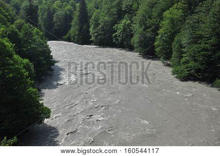 Inguri River. Georgia. Strong current and high level in the river.