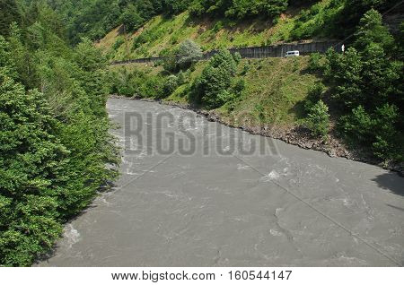 Inguri River. Georgia. Strong current and high level in the river.