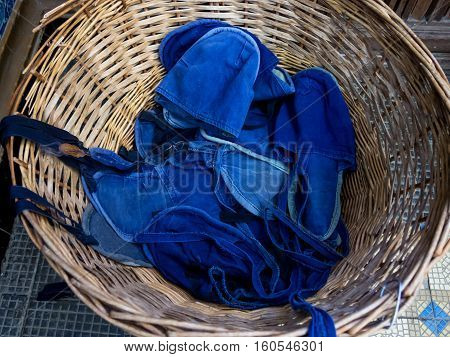 Cloth Armor shoe covers to visit the museum are in a wicker basket at the entrance