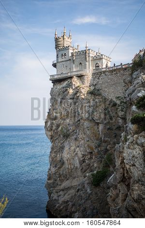 The decorative Neo-Gothic castle Swallow's Nest on the rock over the Black Sea. Gaspra. Crimea