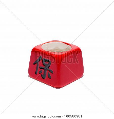 Chinese red cup with black hieroglyph isolated, white background