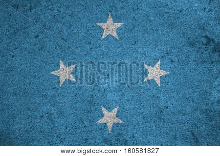 Micronesia Flag On An Old Grunge Background
