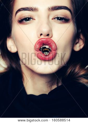 Sexy Girl With Bee On Red Lips
