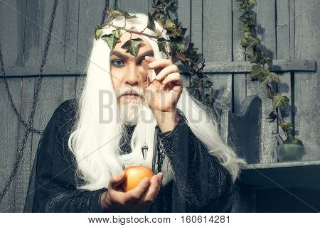 Zeus god or jupiter with enchanted apple in studio