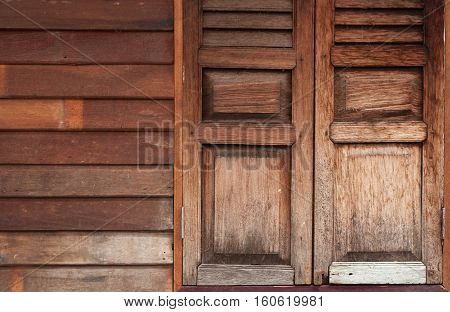 Old wooden window and plank wall background