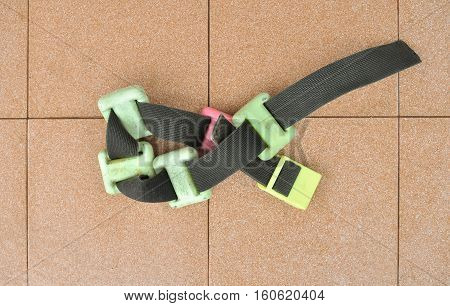 Scuba diver weight belt on the cotta tile