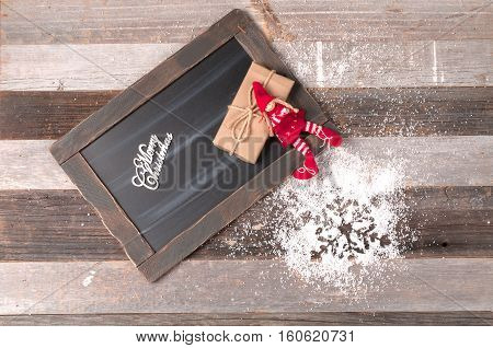Christmas decoration and gift with chalk blackboard for greeting Merry Christmas