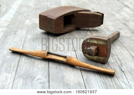Antique Vintage Spokeshave, Mortise Gauge And Block Plane Woodwork Tools On Weathered Wood Backgroun