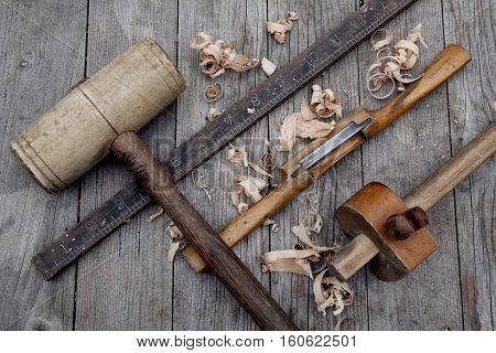 Antique Vintage Ruler, Spokeshave, Mortise Gauge, Block Plane And Mallet Woodwork Tools On Weathered