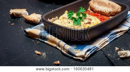 Homemade Moussaka served with bread and chutney (East European cuisine)