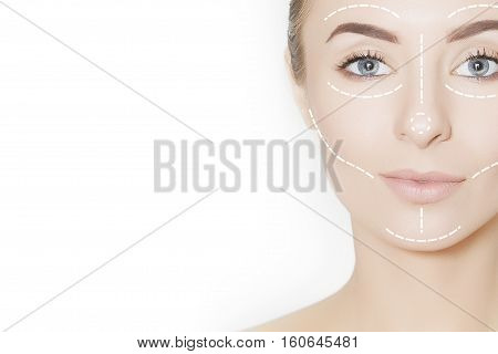 Closeup of female adult with marks on skin for cosmetic medical procedures