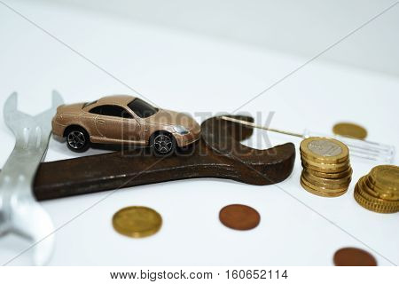 Abstract composition of broken car and repair process.