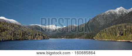 Capilano Reservoir Lake    Snow-Capped Mountains Lions Peaks Vancouver  British Columbia Pacific Northwest