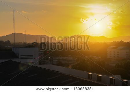 silhouette building in city and sun sky with color tone sunset beautiful colorful evening nature landscape twilight time