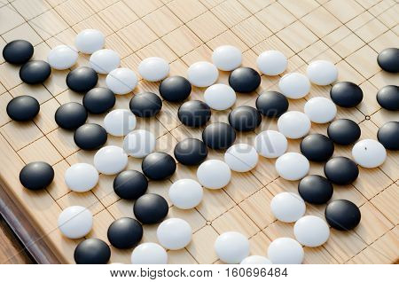 Chinese board game go with black and white stones