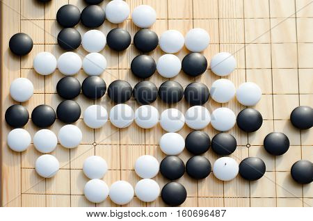 Chinese board game go with black and white stones