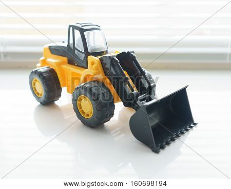 Toy Industrial Vehicle, Plastic Wheel Loader Excavator for Earth Moving Works at Construction Site, Miniature Earth Mover, Backhoe Loader, Frontend Loader with a Big Scoop, Heavy-duty Bulldozer