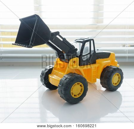 Toy Industrial Vehicle, Plastic Wheel Loader Excavator for Earth Moving Works at Construction Site, Miniature Earth Mover, Backhoe Loader, Frontend Loader with a Big Scoop, Heavy-duty Bulldozer