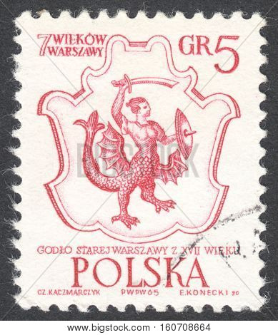 MOSCOW RUSSIA - CIRCA NOVEMBER 2016: a post stamp printed in POLAND shows Arms of Warsaw the series "Warsaw - 7 Centuries. The 700th Anniversary of Warsaw" circa 1965
