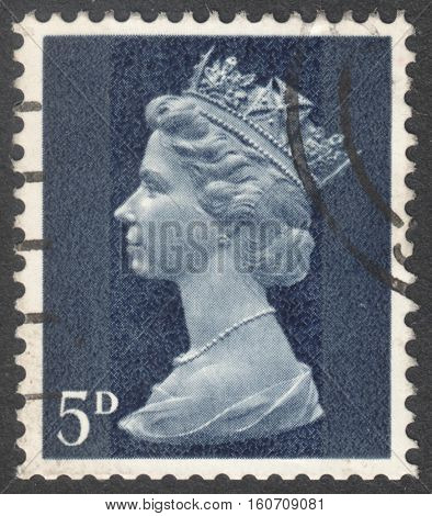 MOSCOW RUSSIA - NOVEMBER 2016: a post stamp printed in the UNITED KINDOM shows a portrait of Portrait of Queen Elizabeth II circa 1970 - 1977