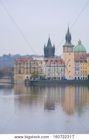 Panorama of an old Prague, bridges and embankment of Vitava river, Czechia