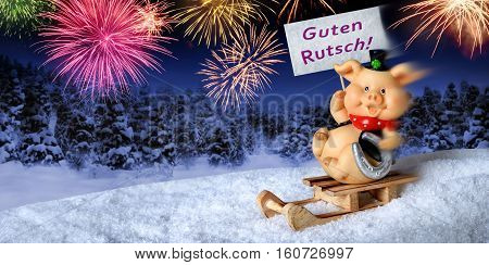 Lucky pig on a sleigh holding a sign saying 