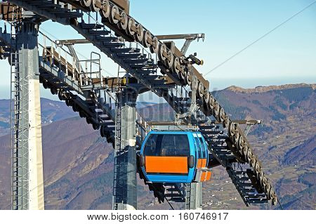 Chairlift mechanical pulleys in ski resort . Gear cable car