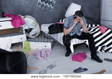 Men Calling From Messy Room