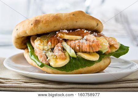 Inidan style sandwich with chicken mango and banana dressed with mango chutney.