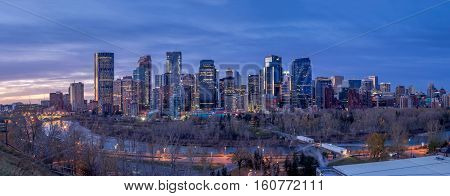 CALGARY, CANADA - OCT 22: Sweeping skyline view at sunrise on October 22, 2016 in Calgary, Alberta. Calgary is home to many oil companies.