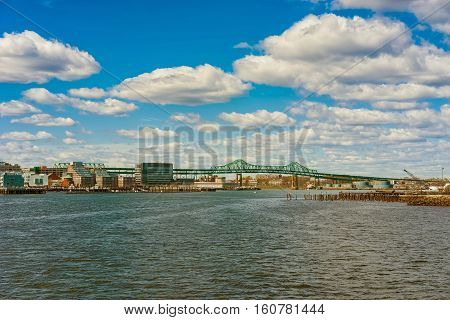 Skyline Of Boston And Tobin Bridge In The Long Distance