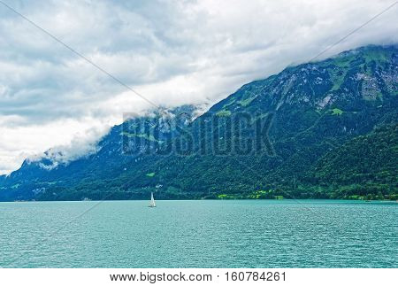 Sailboat At Lake Brienz And Brienzer Rothorn Mountain Bern Switzerland