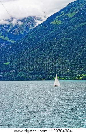 Sailboat On Lake Brienz And Brienzer Rothorn Mountain Bern Switzerland