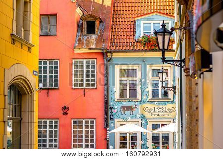 Riga, Latvia - September 22, 2016: Street view with famous 1221 restaurant with traditional latvian food in the old town of Riga city