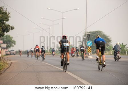 group of bicycle sporter on road on competition.