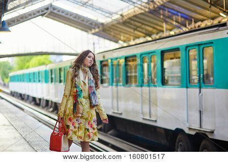Young Beautiful Parisian Woman In Subway