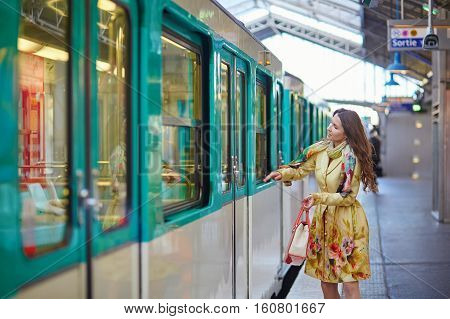 Beautiful Young Woman Running To Catch A Train