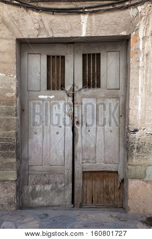 View of old door of rural house in Vilafranca del Bierzo Spain
