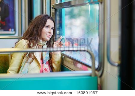 Young Beautiful Parisian Woman In Subway