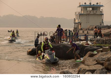 CHIANG RAITHAILAND-APR 32016 : Lifeguard and Triathlon athlete sporter in Golden Triangle Triathlon on April 3 2016 in Chiang sean district Chiang raiThailand.