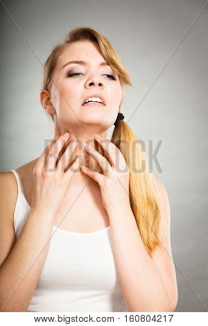 Woman Scratching Her Itchy Neck With Allergy Rash