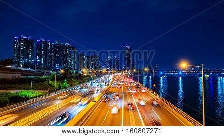 Beautyful of traffic in Seoul at night and cityscape South Korea with motion blur.