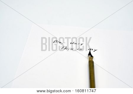Feather Pen On The Beginning Of A Letter