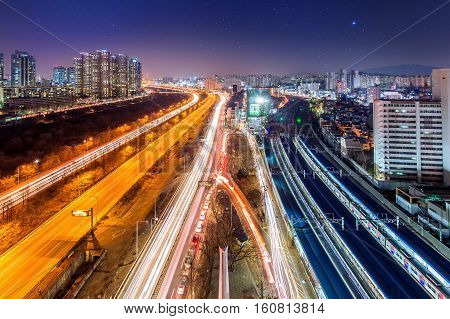Traffic in Singil district Seoul Korea skyline at night.