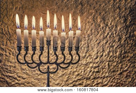 Jewish menorah with candles is traditional symbol for Hanukkah Holiday