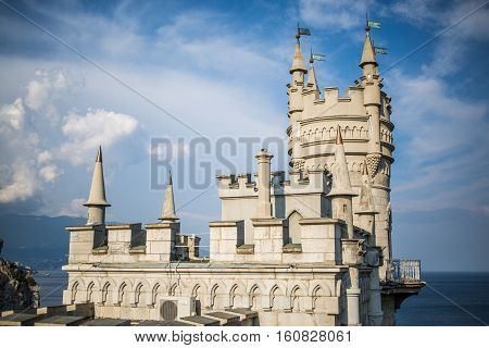 The decorative Neo-Gothic castle Swallow's Nest on the rock over the Black Sea. Gaspra. Crimea