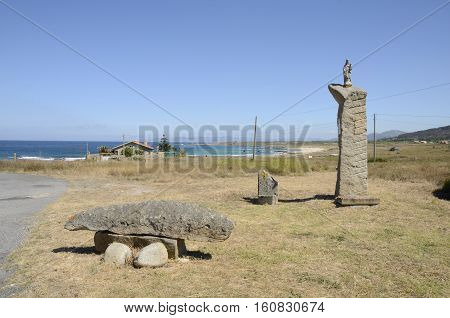 Statue of the Virgin Mary at the beach iof Corrubedo Galicia Spain