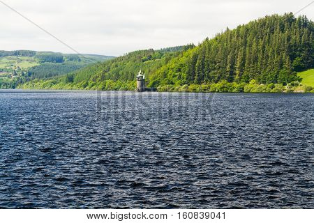Gothic straining tower on Lake Vyrnwy reservoir. Powys Wales United Kingdom.