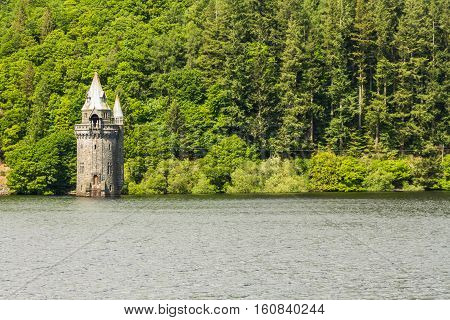 Gothic straining tower on Lake Vyrnwy reservoir. Powys Wales United Kingdom.