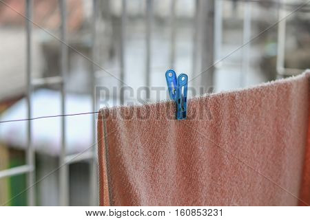 Plastic clothespin pin Close up and chintz drying on washing line